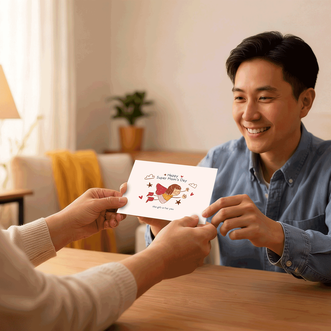 Man Giving His Mother a Happy Super Mom's Day Mother's Day Greeting Card That Turns into a Thousand Gifts